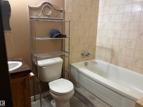 Full bathroom with a bath and vanity - 2008 4Th Ave, Cold Lake, AB - Indoor Photo Showing Bathroom