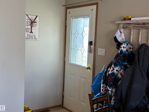 Doorway to outside featuring baseboards - 2008 4Th Ave, Cold Lake, AB - Indoor Photo Showing Other Room