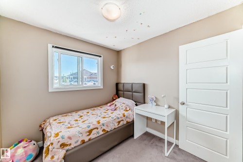 327 Desrochers Boulevard, Edmonton, AB - Indoor Photo Showing Bedroom