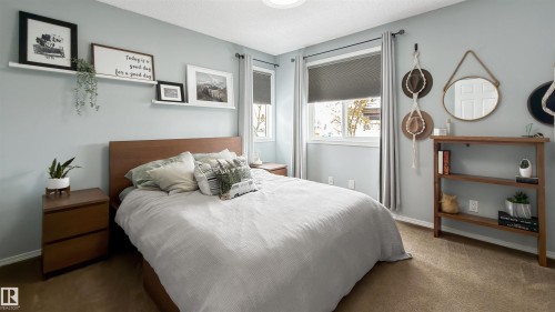 Bedroom with carpet floors and a textured ceiling - 7 Chungo Drive, Devon, AB - Indoor Photo Showing Bedroom