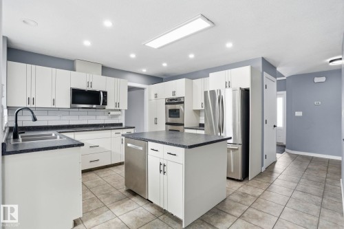 11019 10 Avenue, Edmonton, AB - Indoor Photo Showing Kitchen With Double Sink