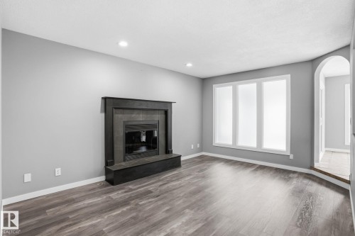 11019 10 Avenue, Edmonton, AB - Indoor Photo Showing Living Room With Fireplace