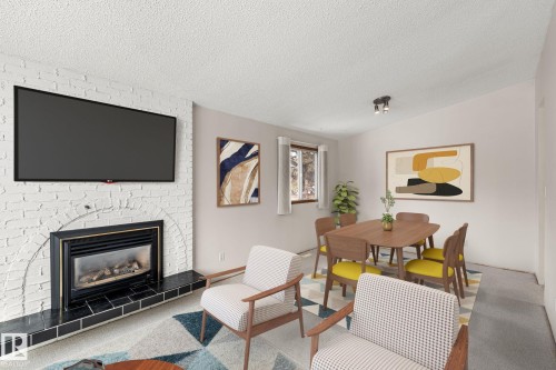 34 Andrew Crescent, St. Albert, AB - Indoor Photo Showing Living Room With Fireplace