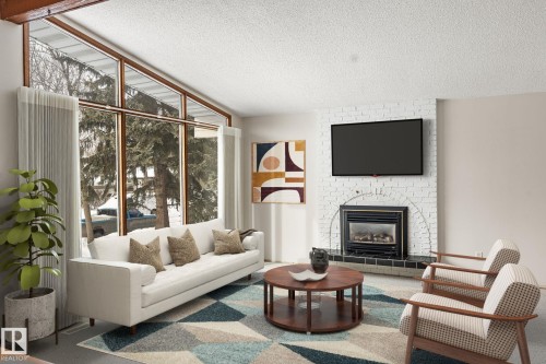 34 Andrew Crescent, St. Albert, AB - Indoor Photo Showing Living Room With Fireplace