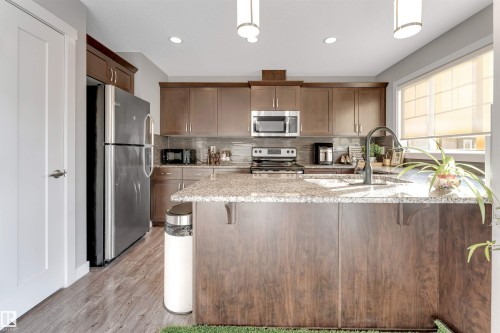 40 5203 149 Avenue, Edmonton, AB - Indoor Photo Showing Kitchen With Stainless Steel Kitchen With Double Sink With Upgraded Kitchen
