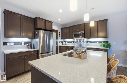 69 Avonlea Way, Spruce Grove, AB - Indoor Photo Showing Kitchen With Double Sink With Upgraded Kitchen