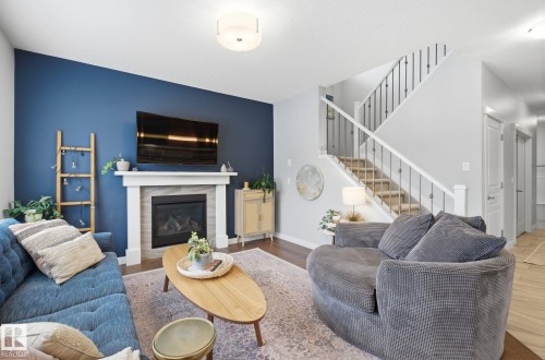 69 Avonlea Way, Spruce Grove, AB - Indoor Photo Showing Living Room With Fireplace