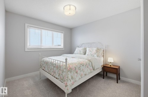 69 Avonlea Way, Spruce Grove, AB - Indoor Photo Showing Bedroom