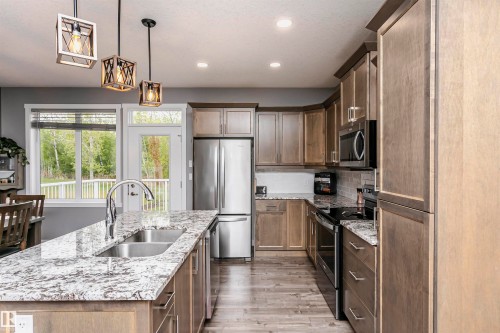 611 55101 Ste Anne Trail, Rural Lac Ste. Anne County, AB - Indoor Photo Showing Kitchen With Double Sink With Upgraded Kitchen