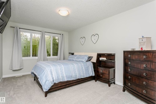 611 55101 Ste Anne Trail, Rural Lac Ste. Anne County, AB - Indoor Photo Showing Bedroom