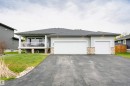 611 55101 Ste Anne Trail, Rural Lac Ste. Anne County, AB  - Outdoor With Facade 