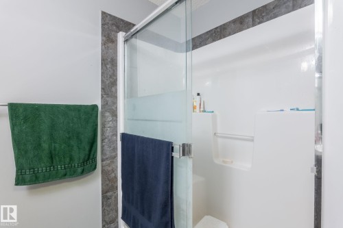 Full bath with a shower stall - 207 2203 44 Avenue, Edmonton, AB - Indoor Photo Showing Bathroom