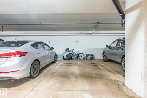Garage featuring a parking deck - 207 2203 44 Avenue, Edmonton, AB - Indoor Photo Showing Garage