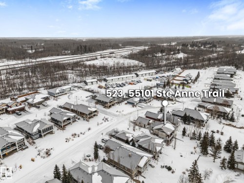 View of snowy aerial view - 523 55101 Ste. Anne Trail, Rural Lac Ste. Anne County, AB - Outdoor With View