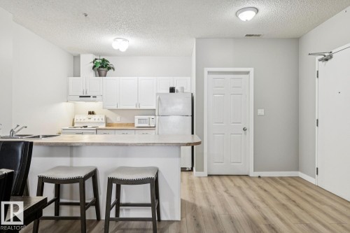 402 9919 105 Street, Edmonton, AB - Indoor Photo Showing Kitchen With Double Sink