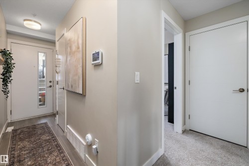 Corridor featuring baseboards - 94 2560 Pegasus Boulevard, Edmonton, AB - Indoor Photo Showing Other Room