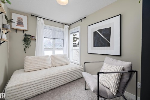 Sitting room featuring carpet flooring and baseboards - 94 2560 Pegasus Boulevard, Edmonton, AB - Indoor Photo Showing Other Room