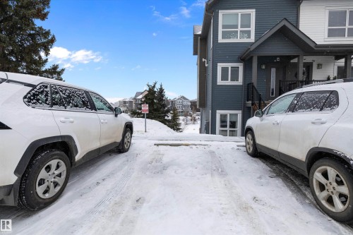 View of property exterior with a residential view - 94 2560 Pegasus Boulevard, Edmonton, AB - Indoor Photo Showing Garage
