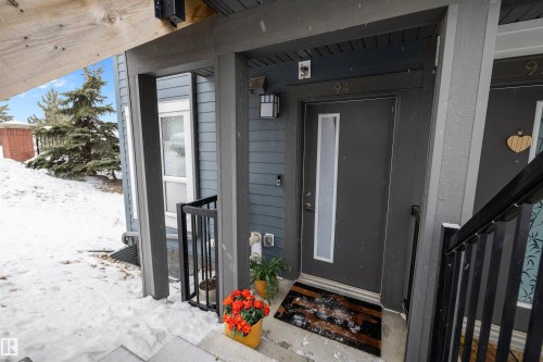 View of snow covered property entrance - 94 2560 Pegasus Boulevard, Edmonton, AB - Outdoor With Exterior