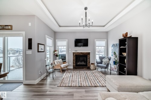 139 Kidd Crescent, Leduc, AB - Indoor Photo Showing Living Room With Fireplace