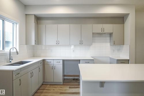 119 Copperhaven Drive, Spruce Grove, AB - Indoor Photo Showing Kitchen With Double Sink