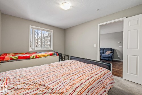 View of carpeted bedroom - 221 5005 165 Avenue, Edmonton, AB - Indoor Photo Showing Bedroom