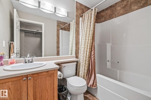 Full bath with vanity and shower / bath combo - 221 5005 165 Avenue, Edmonton, AB - Indoor Photo Showing Bathroom