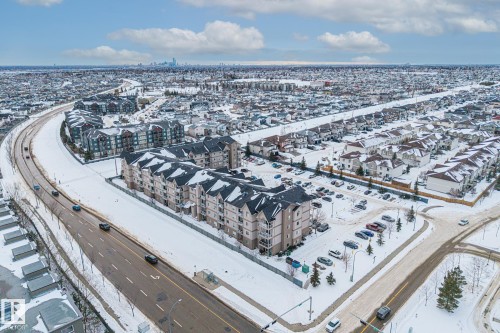 Aerial overview of property's location with nearby urban area - 221 5005 165 Avenue, Edmonton, AB - Outdoor With View