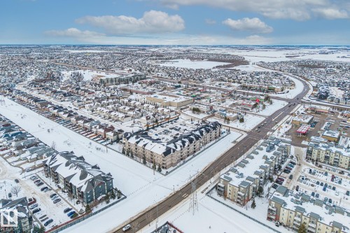 View of snowy aerial view - 221 5005 165 Avenue, Edmonton, AB - Outdoor With View