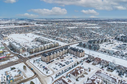 Snowy aerial view with a city view - 221 5005 165 Avenue, Edmonton, AB - Outdoor With View