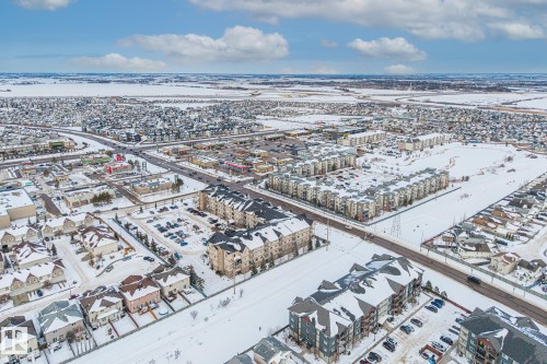 View of snowy aerial view - 221 5005 165 Avenue, Edmonton, AB - Outdoor With View