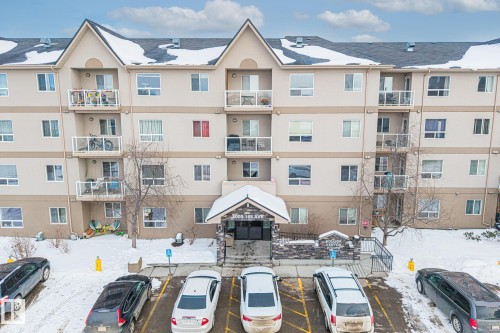 View of apartment building / complex with uncovered parking - 221 5005 165 Avenue, Edmonton, AB - Outdoor With Balcony With Facade