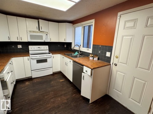 6612 36A Avenue, Edmonton, AB - Indoor Photo Showing Kitchen With Double Sink