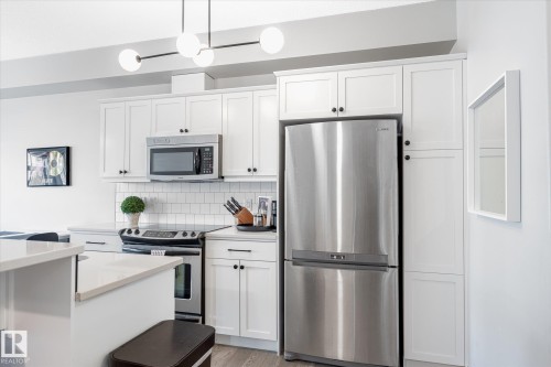 111 9603 98 Avenue, Edmonton, AB - Indoor Photo Showing Kitchen With Upgraded Kitchen