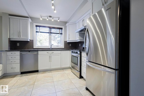 8907 140 Street Nw, Edmonton, AB - Indoor Photo Showing Kitchen With Stainless Steel Kitchen