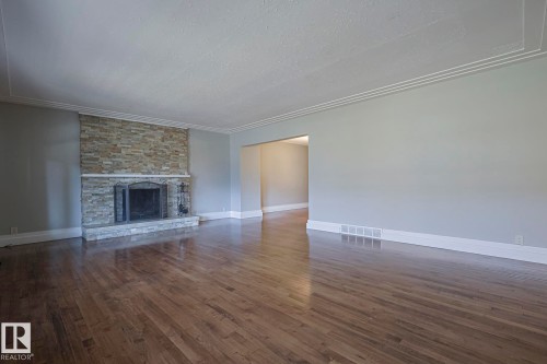 8907 140 Street Nw, Edmonton, AB - Indoor Photo Showing Living Room With Fireplace
