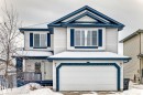 View of front of home featuring a garage and driveway - 4619 151 Avenue Nw, Edmonton, AB  - Outdoor 
