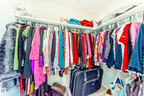 View of walk in closet - 4619 151 Avenue Nw, Edmonton, AB - Indoor With Storage