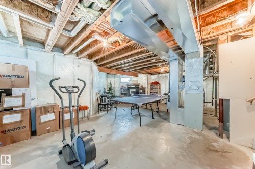 Basement featuring heating unit - 4619 151 Avenue Nw, Edmonton, AB - Indoor Photo Showing Basement