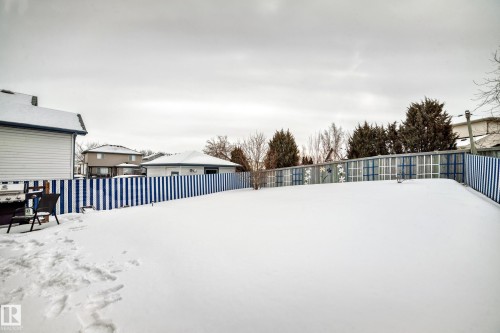View of yard covered in snow - 4619 151 Avenue Nw, Edmonton, AB - Outdoor