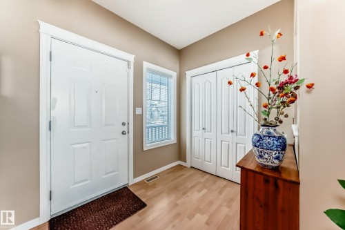 Foyer featuring light wood finished floors and baseboards - 4619 151 Avenue Nw, Edmonton, AB - Indoor Photo Showing Other Room
