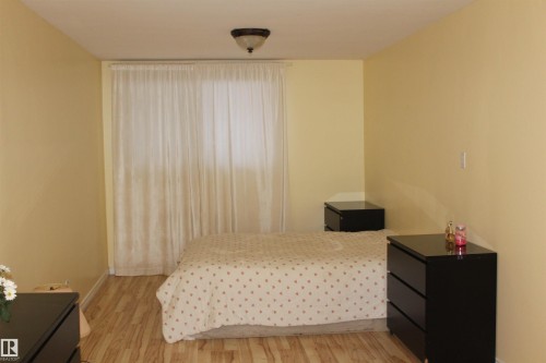 Bedroom featuring light wood finished floors and baseboards - 12432 134 Street, Edmonton, AB - Indoor Photo Showing Bedroom