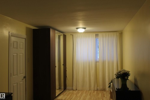 Bedroom with light wood finished floors - 12432 134 Street, Edmonton, AB - Indoor Photo Showing Other Room