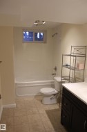 Full bath with vanity and  shower combination - 