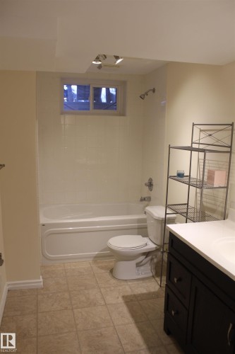 Full bath with vanity and  shower combination - 12432 134 Street, Edmonton, AB - Indoor Photo Showing Bathroom