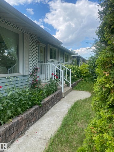 View of home's exterior with a porch - 12432 134 Street, Edmonton, AB - Outdoor