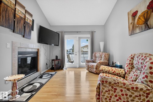 36 3003 34 Avenue, Edmonton, AB - Indoor Photo Showing Living Room With Fireplace