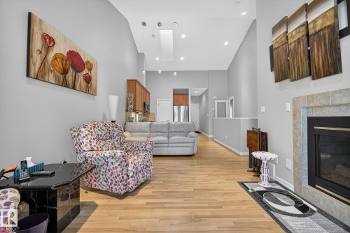 36 3003 34 Avenue, Edmonton, AB - Indoor Photo Showing Living Room With Fireplace