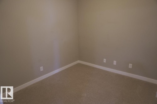 409 5810 Mullen Place, Edmonton, AB - Indoor Photo Showing Other Room