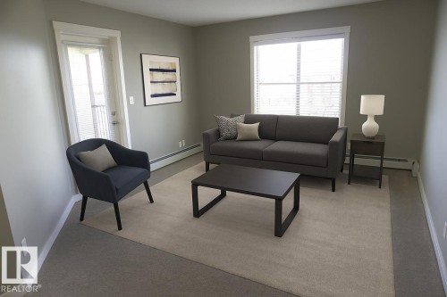 409 5810 Mullen Place, Edmonton, AB - Indoor Photo Showing Living Room